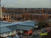 view of industry and religion  wind turbinesIlford London Essex copyright free photo royalty free photo